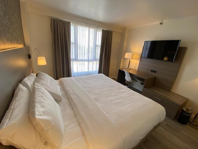 Garden Inn & Suites - Jfk Нью-Йорк Экстерьер фото