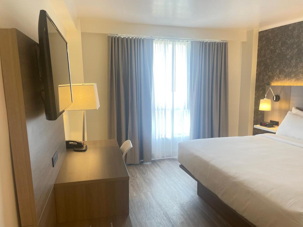Garden Inn & Suites - Jfk Нью-Йорк Экстерьер фото